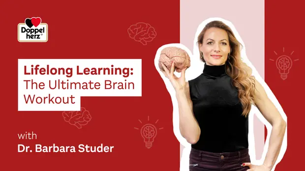 Texte alternatif : Une femme souriante tient une maquette de cerveau à deux mains. Elle porte un haut noir et se tient devant un fond rouge. Le texte à gauche annonce "Lifelong Learning: The Ultimate Brain Workout" avec le nom "Dr. Barbara Studer". Des illustrations de cerveaux et d’ampoules sont également présentes.